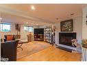 11 Meadow Park Drive, Huntsville, ON  - Indoor Photo Showing Living Room With Fireplace 