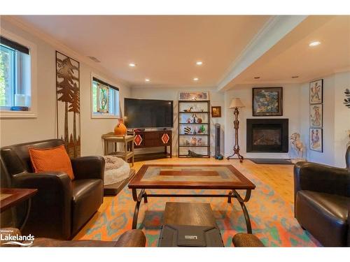 11 Meadow Park Drive, Huntsville, ON - Indoor Photo Showing Living Room With Fireplace