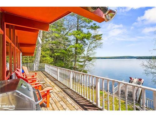 5863 Kennisis Lake Road, Haliburton, ON - Outdoor With Body Of Water With Deck Patio Veranda With Exterior