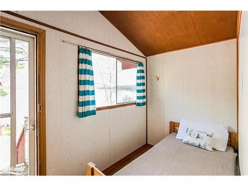 5863 Kennisis Lake Road, Haliburton, ON - Indoor Photo Showing Bedroom