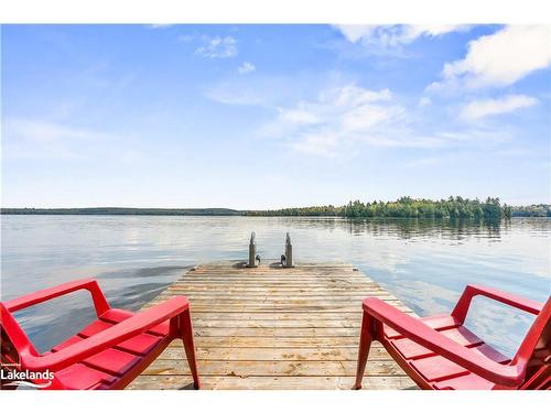 5863 Kennisis Lake Road, Haliburton, ON - Outdoor With Body Of Water With Deck Patio Veranda With View