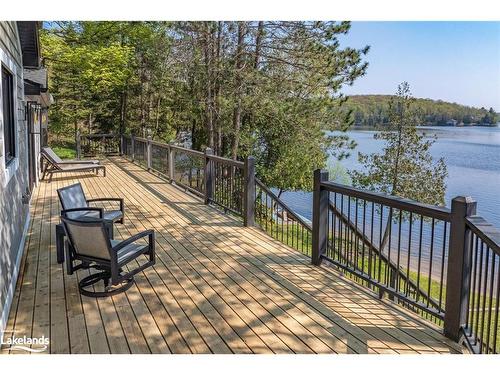 1017 White Pine Road, Dwight, ON - Outdoor With Body Of Water With Deck Patio Veranda With Exterior