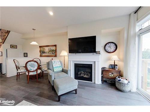 8 Little River Crossing, Wasaga Beach, ON - Indoor Photo Showing Living Room With Fireplace