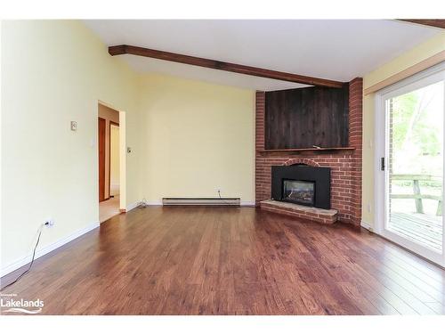 212 39Th Street S, Wasaga Beach, ON - Indoor Photo Showing Living Room With Fireplace