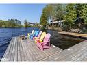 207-10 Coveside Drive, Huntsville, ON  - Outdoor With Body Of Water With Deck Patio Veranda 