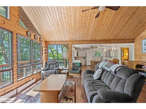 11120 St. Margarets Island, Algonquin Highlands, ON - Indoor Photo Showing Living Room With Fireplace