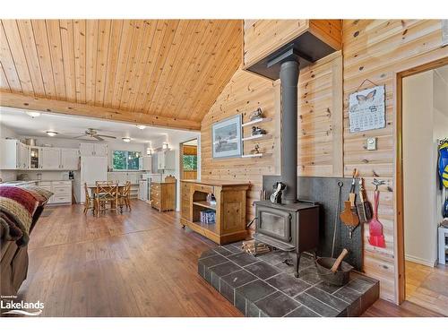 11120 St. Margarets Island, Algonquin Highlands, ON - Indoor Photo Showing Other Room With Fireplace