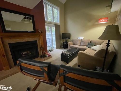 21-146 Settlers Way, The Blue Mountains, ON - Indoor Photo Showing Living Room With Fireplace