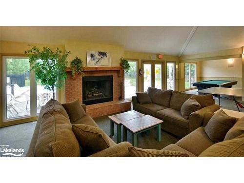 21-146 Settlers Way, The Blue Mountains, ON - Indoor Photo Showing Living Room With Fireplace