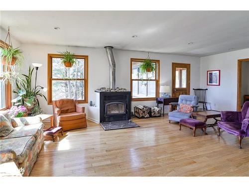 1888 Falkenburg Road, Muskoka Lakes, ON - Indoor Photo Showing Living Room With Fireplace