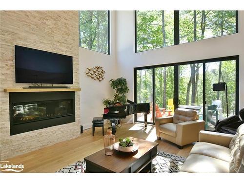 183 Woodland Drive, Wasaga Beach, ON - Indoor Photo Showing Living Room With Fireplace