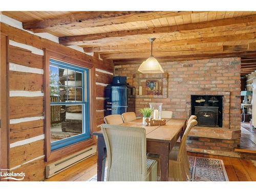 1120 Muskoka 10 Road, Huntsville, ON - Indoor Photo Showing Dining Room With Fireplace