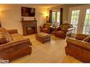 186 Lakewood Park Road, Huntsville, ON  - Indoor Photo Showing Living Room With Fireplace 