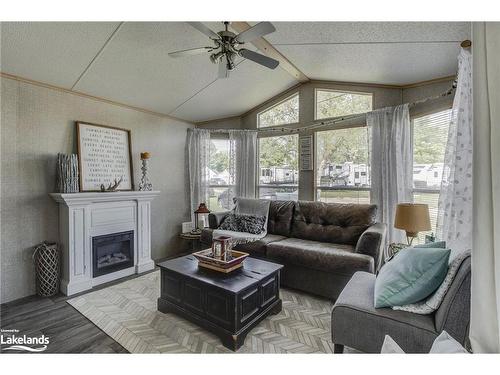 46 Lakeshore Road, Midland, ON - Indoor Photo Showing Living Room With Fireplace