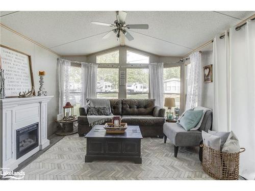 46 Lakeshore Road, Midland, ON - Indoor Photo Showing Living Room With Fireplace