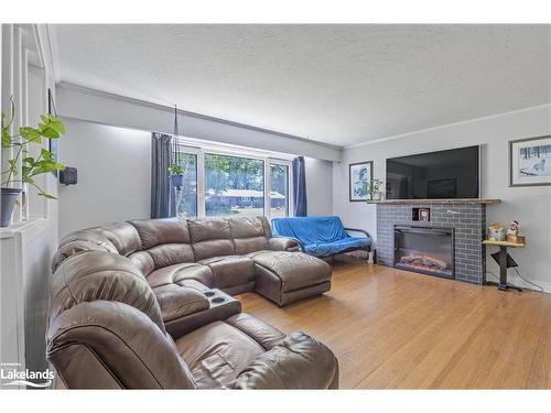 1002 Hugel Avenue, Midland, ON - Indoor Photo Showing Living Room With Fireplace