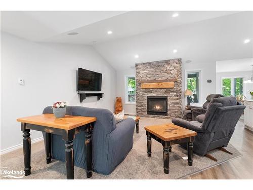 110 Evergreen Avenue, Tiny, ON - Indoor Photo Showing Living Room With Fireplace