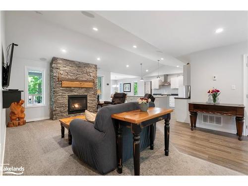 110 Evergreen Avenue, Tiny, ON - Indoor Photo Showing Other Room With Fireplace