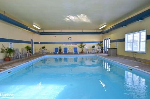 70 Pennsylvania Avenue, Wasaga Beach, ON - Indoor Photo Showing Other Room With In Ground Pool