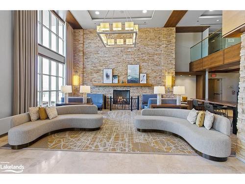 377-220 Gord Canning Drive, The Blue Mountains, ON - Indoor Photo Showing Living Room With Fireplace