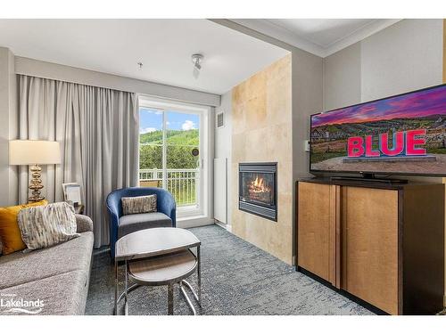 377-220 Gord Canning Drive, The Blue Mountains, ON - Indoor Photo Showing Living Room With Fireplace