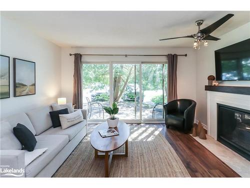 136-27 Dawson Drive, Collingwood, ON - Indoor Photo Showing Living Room With Fireplace