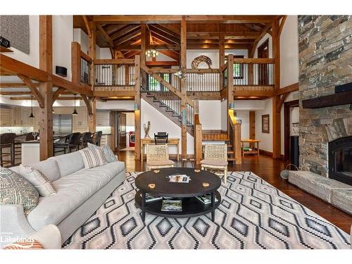 84 Bigwin Island, Lake Of Bays, ON - Indoor Photo Showing Living Room With Fireplace