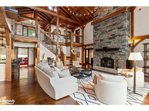 84 Bigwin Island, Lake Of Bays, ON - Indoor Photo Showing Living Room With Fireplace