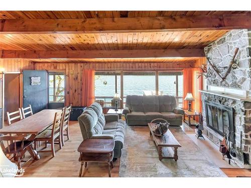 785 Harrison Trail, Georgian Bay Twp, ON - Indoor Photo Showing Living Room With Fireplace