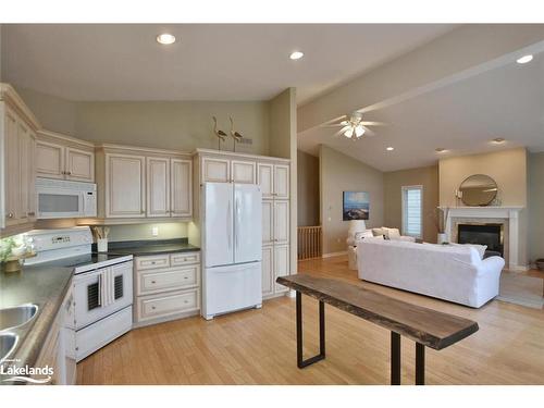 46 William Avenue, Wasaga Beach, ON - Indoor Photo Showing Kitchen With Fireplace