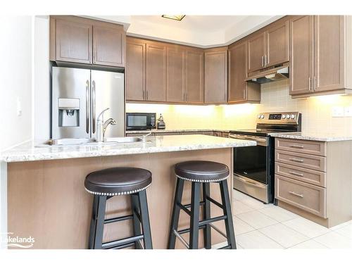 97 Tracey Lane, Collingwood, ON - Indoor Photo Showing Kitchen With Upgraded Kitchen