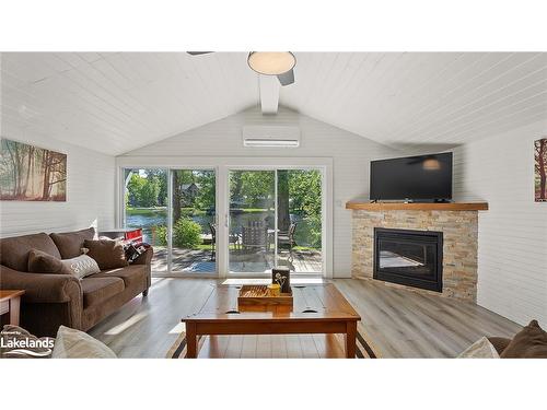 1029 Beadale Lane, Gravenhurst, ON - Indoor Photo Showing Living Room With Fireplace