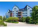 207-130 Steamship Bay Road, Gravenhurst, ON  - Outdoor With Facade 