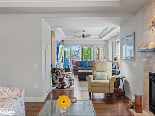 207-130 Steamship Bay Road, Gravenhurst, ON - Indoor Photo Showing Living Room With Fireplace