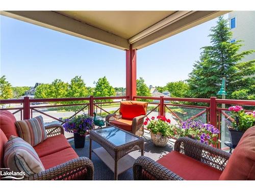 207-130 Steamship Bay Road, Gravenhurst, ON - Indoor Photo Showing Living Room With Fireplace