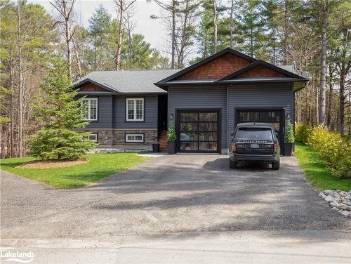 149 Bowyer Road W, Huntsville, ON - Outdoor With Facade