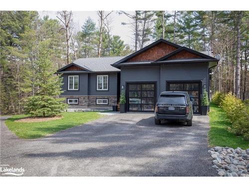 149 Bowyer Road W, Huntsville, ON - Outdoor With Facade