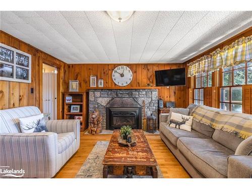 185 West Waseosa Lake Road, Huntsville, ON - Indoor Photo Showing Living Room With Fireplace