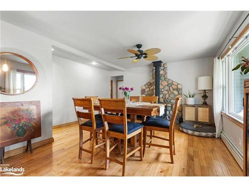 2 Dunlop Drive, Coldwater, ON - Indoor Photo Showing Dining Room With Fireplace