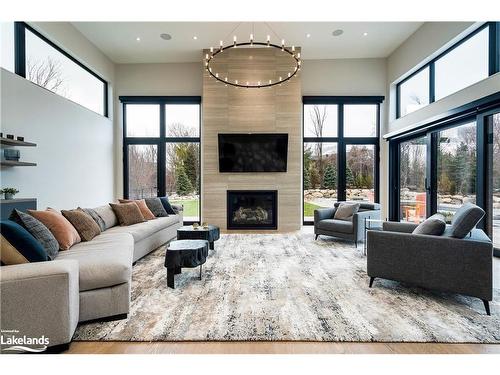 102 Salzburg Place, The Blue Mountains, ON - Indoor Photo Showing Living Room With Fireplace