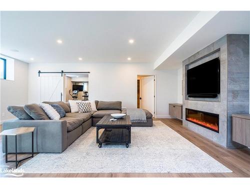 102 Salzburg Place, The Blue Mountains, ON - Indoor Photo Showing Living Room With Fireplace