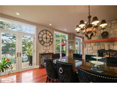 190 Melissa Lane, Tiny, ON - Indoor Photo Showing Dining Room With Fireplace