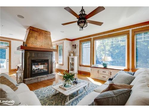 42 Menominee Lake Road, Huntsville, ON - Indoor Photo Showing Living Room With Fireplace