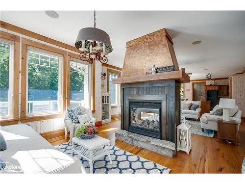 42 Menominee Lake Road, Huntsville, ON - Indoor Photo Showing Living Room With Fireplace