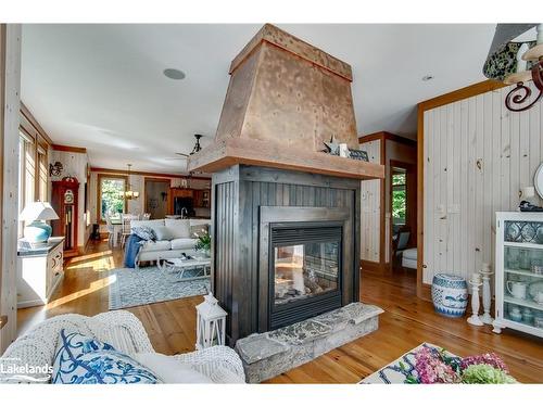 42 Menominee Lake Road, Huntsville, ON - Indoor Photo Showing Living Room With Fireplace