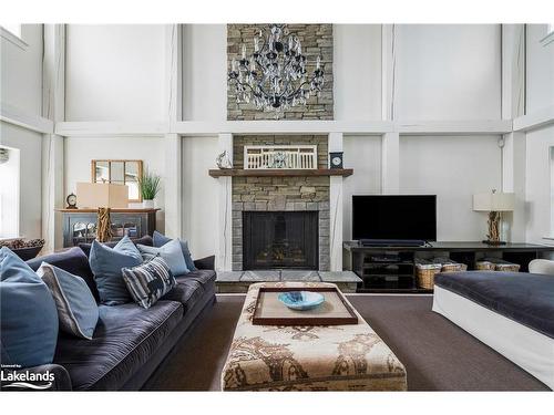 129 Snowbridge Way, The Blue Mountains, ON - Indoor Photo Showing Living Room With Fireplace