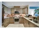 303-130 Steamship Bay Road, Gravenhurst, ON  - Indoor Photo Showing Kitchen With Double Sink 