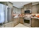 303-130 Steamship Bay Road, Gravenhurst, ON  - Indoor Photo Showing Kitchen With Stainless Steel Kitchen 