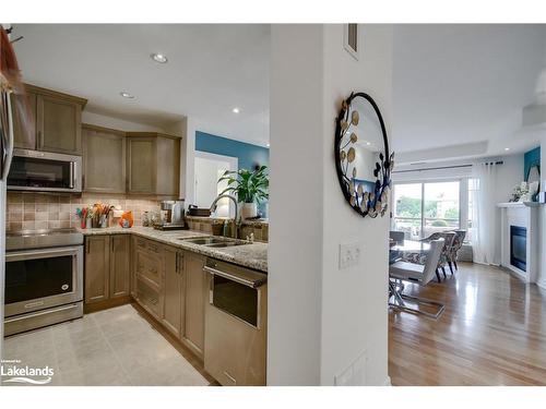 303-130 Steamship Bay Road, Gravenhurst, ON - Indoor Photo Showing Kitchen With Double Sink