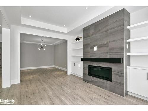 7-11 Bay Street E, Thornbury, ON - Indoor Photo Showing Living Room With Fireplace